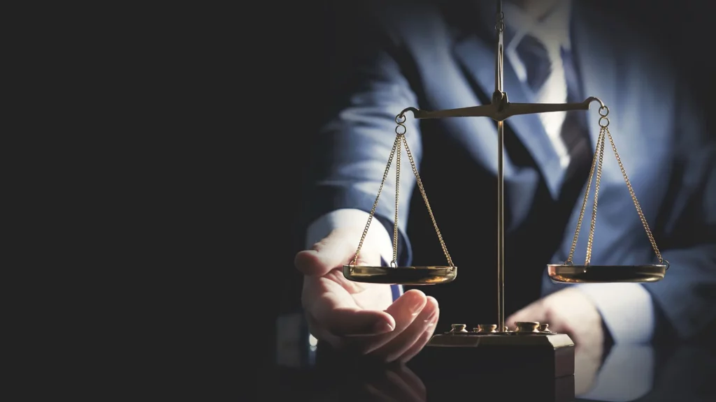 a crew member cruise ship injury lawyer looking at the scales of justice