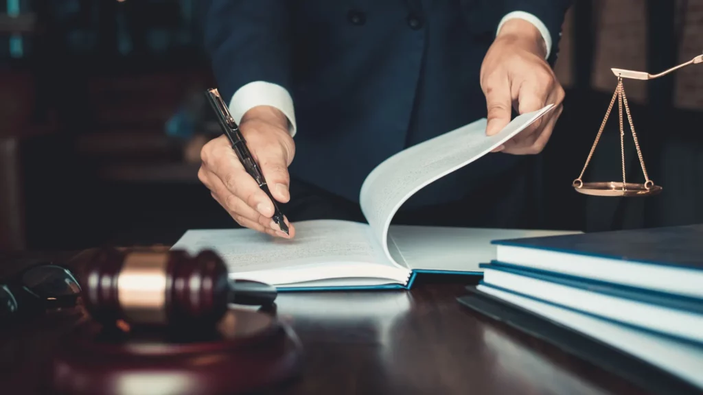 lawyer for cruise ship crew member accidents reviewing documents about a client's case